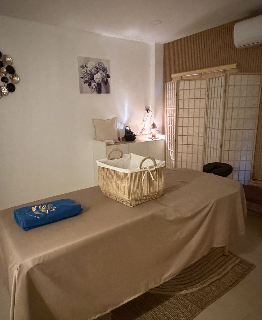 Treatment room with massage bed